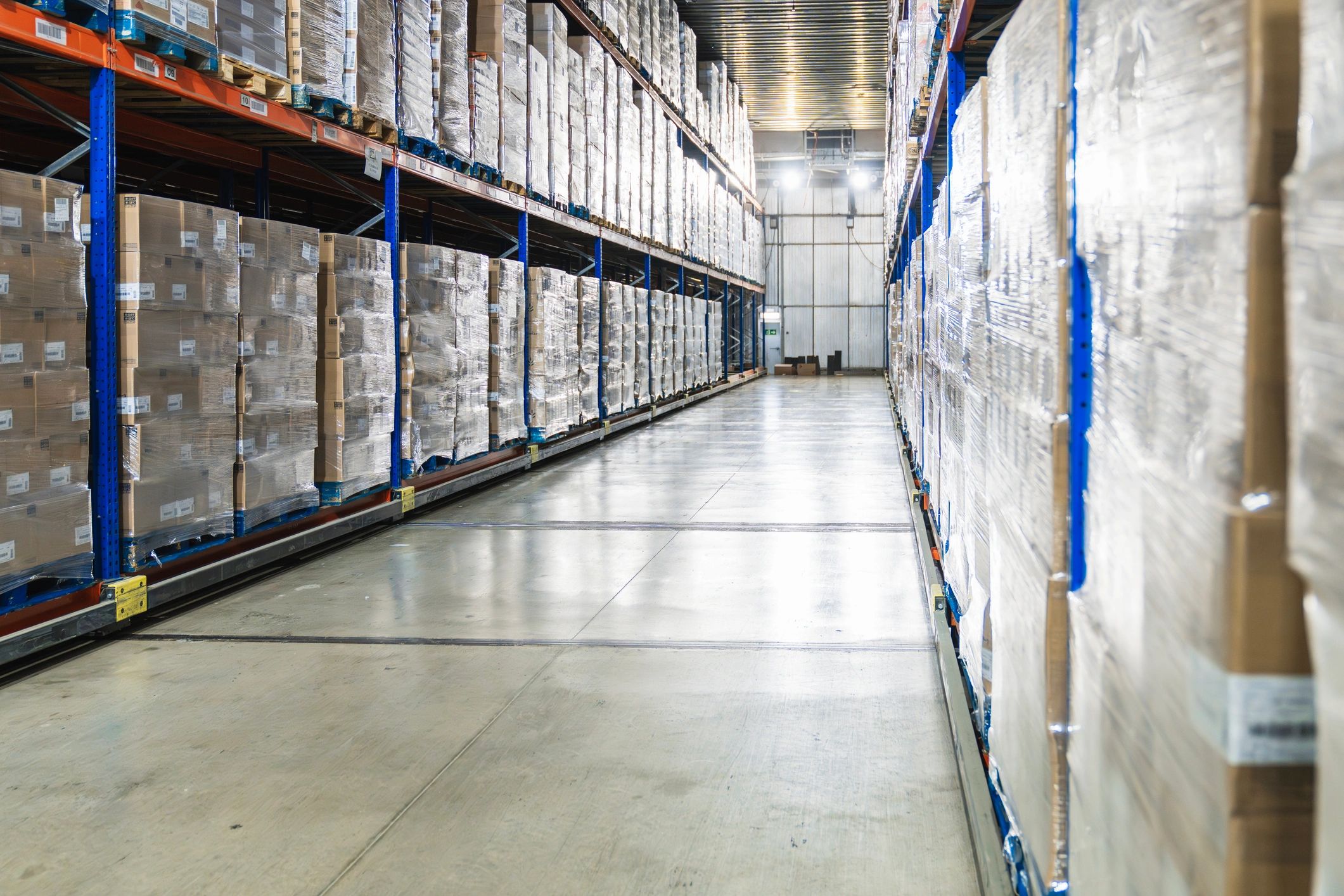 Cold storage warehouse aisle with pallets